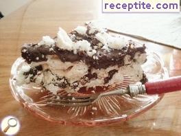 Chocolate layered cake with homemade kisses Chocolate layered cake with homemade kisses
