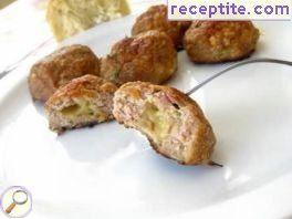 Meatballs stuffed with ham and cheese