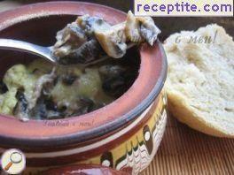 Pot with eggplant and mushrooms