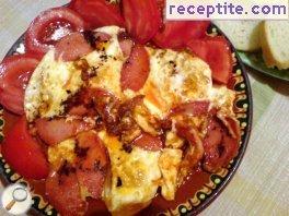 Poached eggs with sausage and cheese
