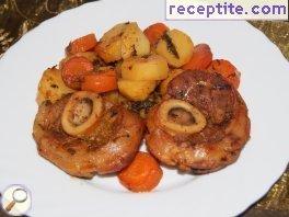 Veal shank with potatoes and carrots