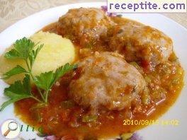 Meatballs with tomato sauce and roasted peppers