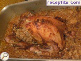 Stuffed turkey in oven