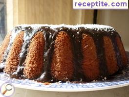 Coconut sponge cake with cocoa glaze