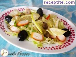 Green salad with crab sticks and capers