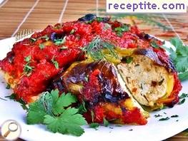 Roasted peppers stuffed with feta cheese and tomato sauce