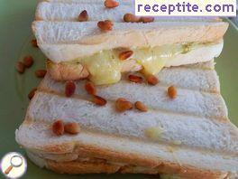 Sandwiches with pesto and pine nuts