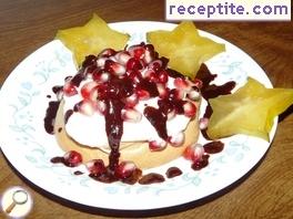 Mini Pavlova dessert with pomegranate