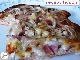 White pizza with bacon, Gorgonzola and rosemary