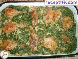 Baked legs with green onions