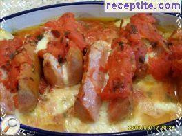 Sausage with cheese and tomato oven