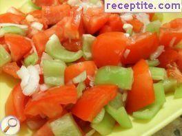Salad of fresh raw tomatoes and peppers Salad of fresh raw tomatoes and peppers
