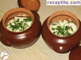 Potato patties with meat and mushrooms in a pot Potato patties with meat and mushrooms in a pot