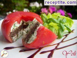 Stuffed tomato with goat feta cheese and olive paste