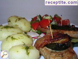 Roast meat with zucchini and bacon