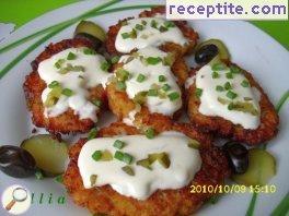 Cutlets with cauliflower sauce of melted cheese Cutlets with cauliflower sauce of melted cheese