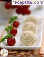 Balls of feta cheese and grapes