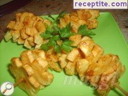 Skewers fried potato blossoms