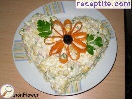 Colorful potato salad with mayonnaise and puree