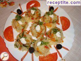 Breaded herring and rice with vegetables