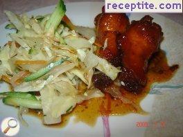 Caramelized chicken with salad Caramelized chicken with salad