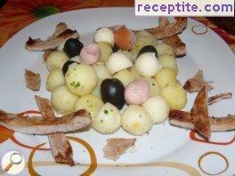 Warm salad with potato croquettes