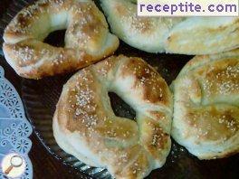 Gevreks of readymade dough with sesame and sugar