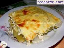 Vegan moussaka with onions and cheese