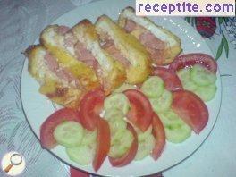 Roll of eggs with sausage Roll of eggs with sausage