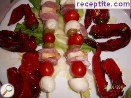 Mini-skewers with baby mozzarella Mini-skewers with baby mozzarella