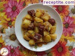 Potatoes with rosemary and raw sausage