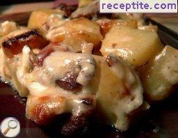 Pork with potatoes and three cheeses