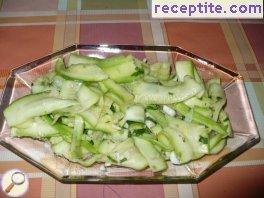 Raw zucchini salad with walnuts