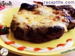 Pork chops with cheese and walnuts