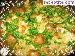 Marinated chicken legs with processed cheese and mushrooms