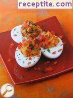 Stuffed eggs with tomato chutney