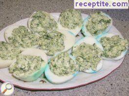 Eggs stuffed with spinach and cheese