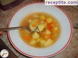 Potato soup with tomato and noodles