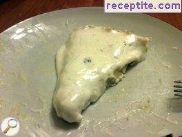 Potatoes with savory cheese and milk garlic sauce Potatoes with savory cheese and milk garlic sauce