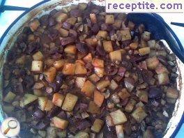 Potatoes with pork kidneys and mushrooms in the oven