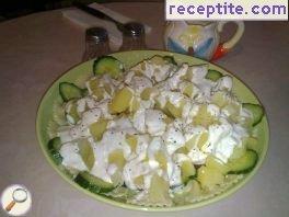 Laying on salad box of farfalle