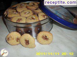 Small cookies in paper baskets Small cookies in paper baskets