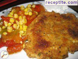 Chicken cutlets with processed cheese in the oven