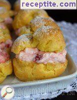 Eclairs with cream yoghurt and strawberries