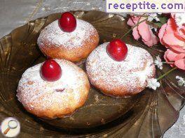 Muffins with cherries, feta cheese and orange peels