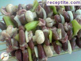 Skewers with chicken hearts and vegetables