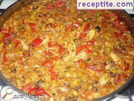 Paella with chicken and seafood