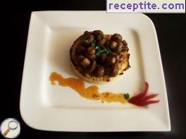 Champignons on a bed of fluffy potatoes Champignons on a bed of fluffy potatoes