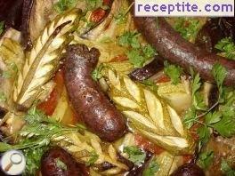 Sausage with vegetables in the oven