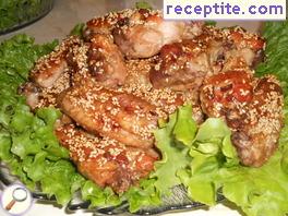 Chicken wings with soy sauce, garlic and sesame